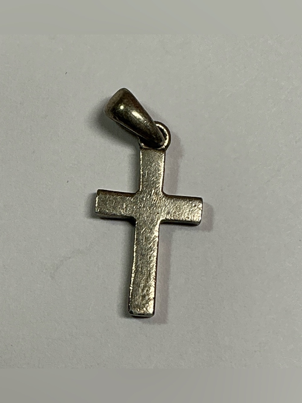 Sterling Silver Plain Cross Pendant. 7/8 inches long